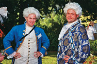 Darren Dahl (l) and Paul Chwelos (right) of the Sauder School of Business reminded everyone of the game's origins by appearing as retro French noblemen.
