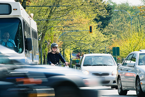 More people would jump on their bikes if cycling paths were separated from traffic, UBC Prof. Kay Teschke says - photo by Martin Dee