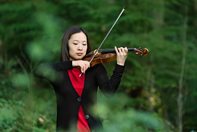 Eugenia Choi's violin connects her to ecosystems in danger - photo by Martin Dee