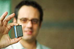 Jorge Marques displays a hydrogen fuel cell - photo by Darin Dueck