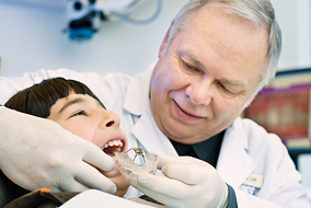 Prof. Alan Lowe’s invention, an oral appliance called Klearway ™, is being tested to treat sleep apnea in children - photo by Martin Dee